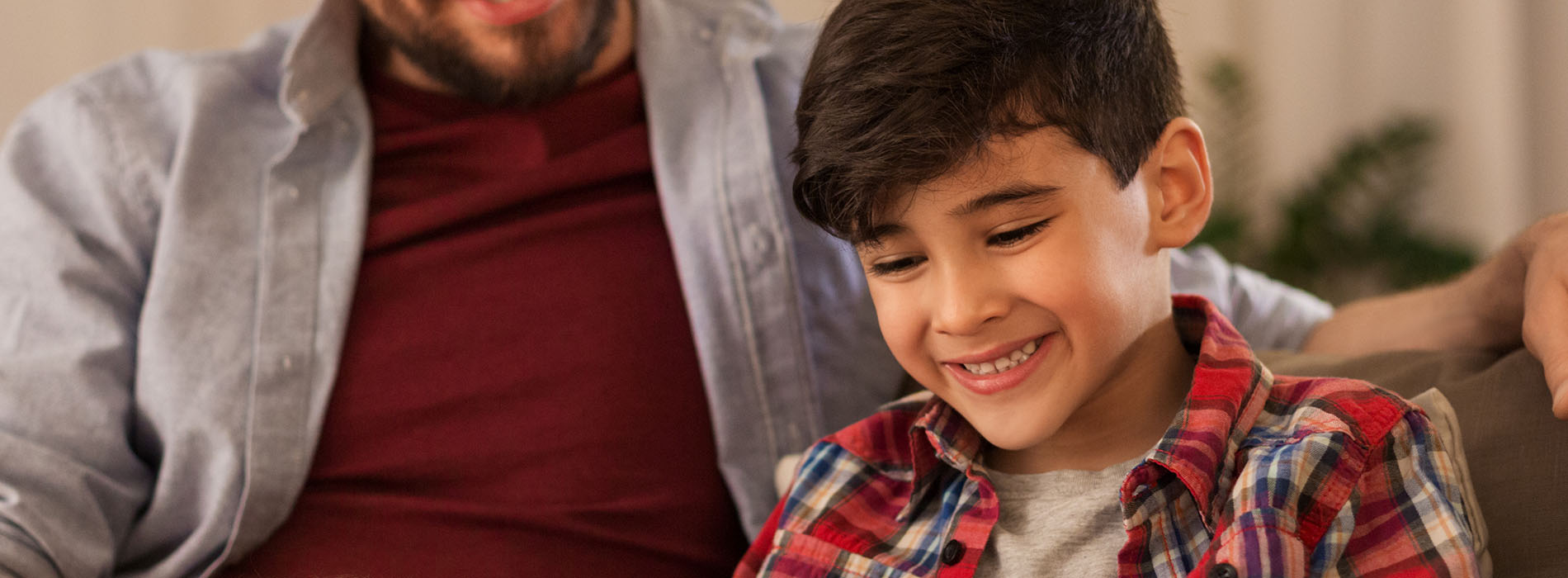 Family bonding moment captured in a cozy living room setting.